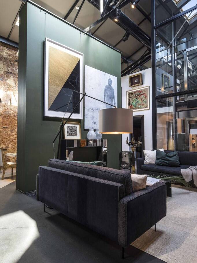 SAV forest green autumn & winter showroom interior design architecture project luxury contemporary vintage art pieces coordinating textile sofas light furniture 