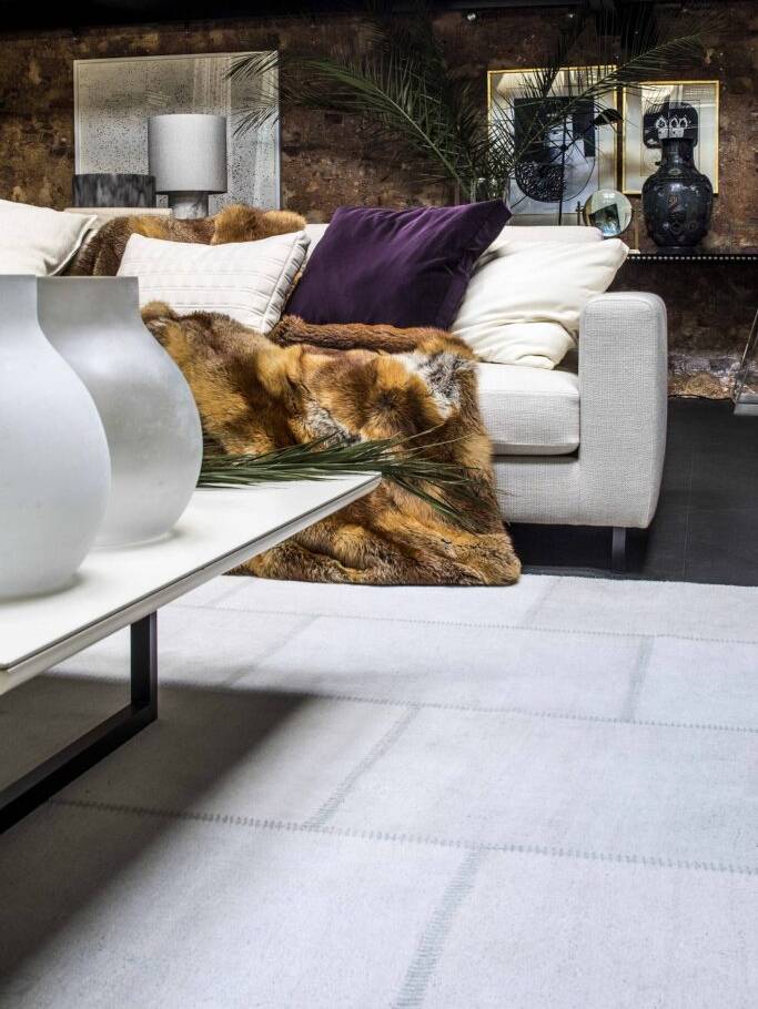 SAV forest green autumn & winter showroom interior design architecture project luxury contemporary vintage art pieces coordinating textile sofas light furniture 