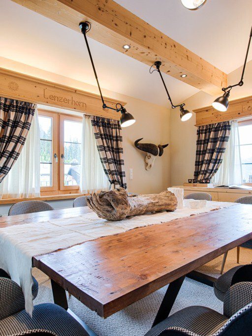 SAV ski getaway in switzerland international interior design architecture project luxury rustic comfortable decoration woods leathers fabrics mixed styles colours textures winter house chalet fireplace